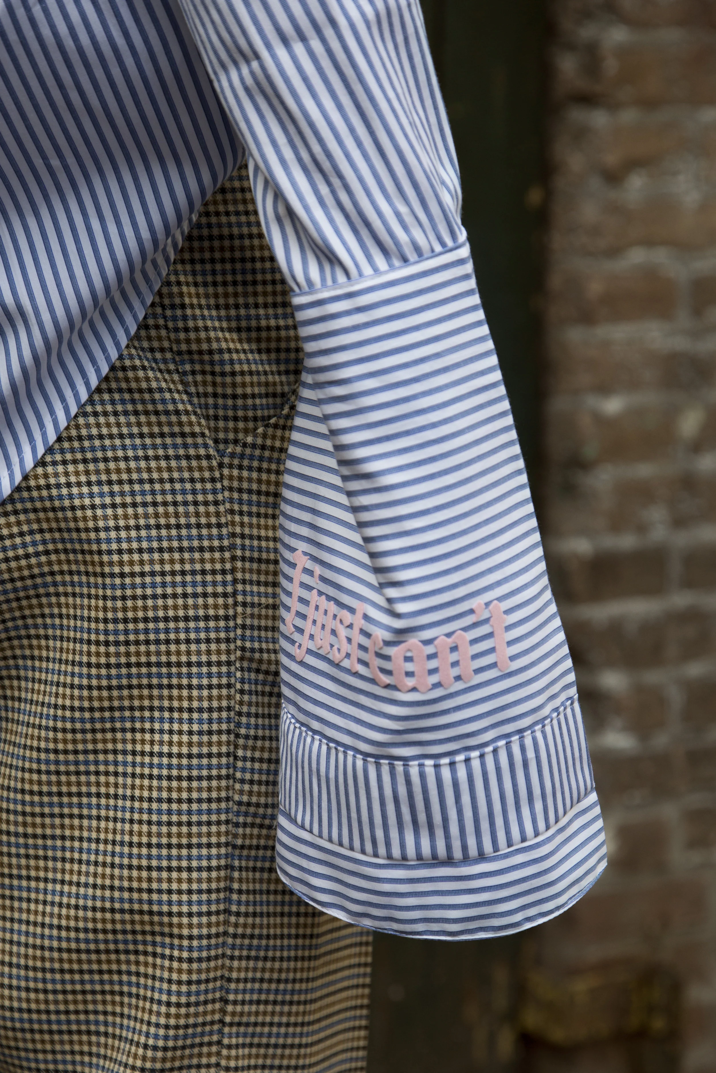 The statement „understand me if you can“ flock printed on the collar of the shirt visualizes an indifferent but challenging attitude. All in all expressing how visual codes and dress in particular have the ability to define and communicate an identity but also define and prescribe a certain identity on an individual.