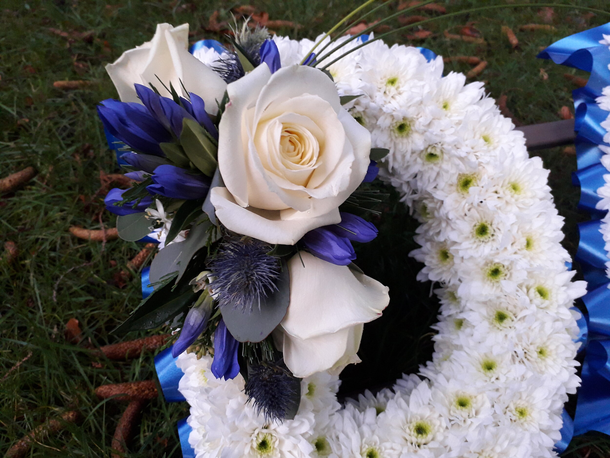 Blue and White Rose Dad Funeral Tribute.jpg