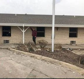 (This photo was captured last week in Pacific Junction, Iowa. Dan's right hand is showing the height of the flood waters)