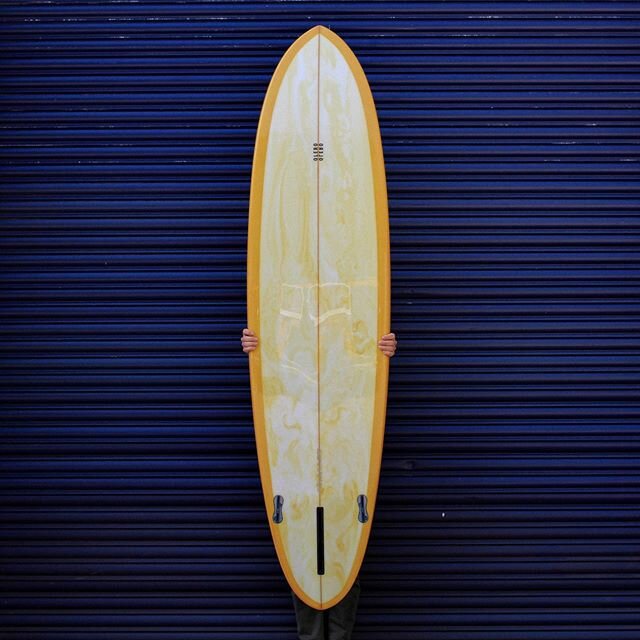 Custom 7&rsquo;7 Rambler with resin swirl inlay for @workshop7 handshaped as always, made from start to finish in house by one pair of hands
.
.
.
.
.
#customsurfboard #handshapedsurfboards #rambler #midlength #resinswirl #resintint #singlefin #surft