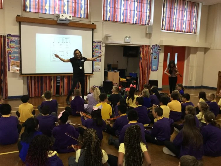 Year six pupils taking part in a workshop ahead of the iPad Concerto debut performance