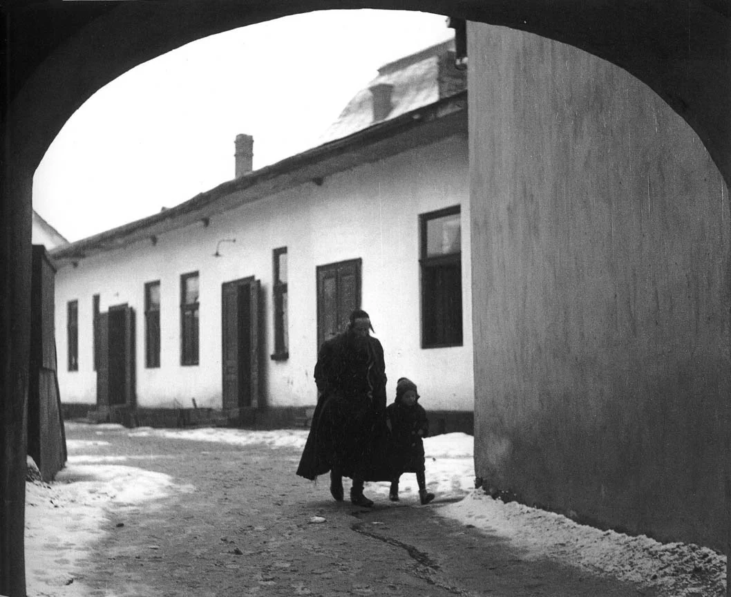 Vishniac, "A Son Goes to Chedar" ( Father taking his son to school), 1937 — also currently on display at Neomodern.