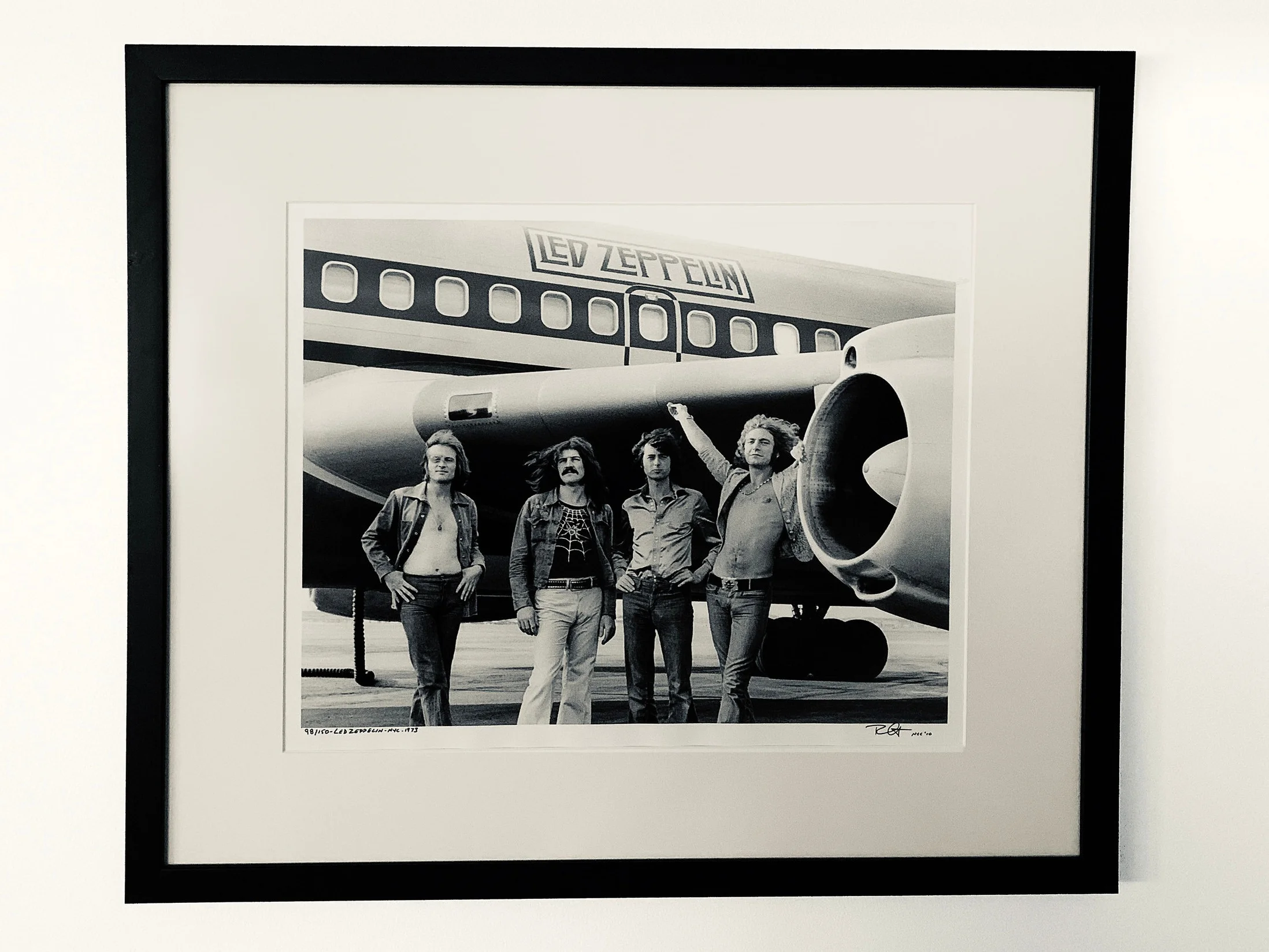 Bob Gruen, “Led Zeppelin/Jet” (1973) John Paul Jones, John Bonham, Jimmy Page and Robert Plant of Led Zeppelin arriving at the Teterboro, N.J., airport en route to a 1973 gig in Pittsburgh.