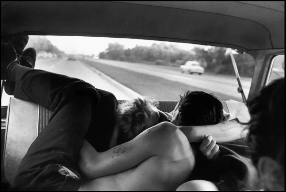 Bruce Davidson “ Brooklyn Gang” (couple necking in car) ( 1959)