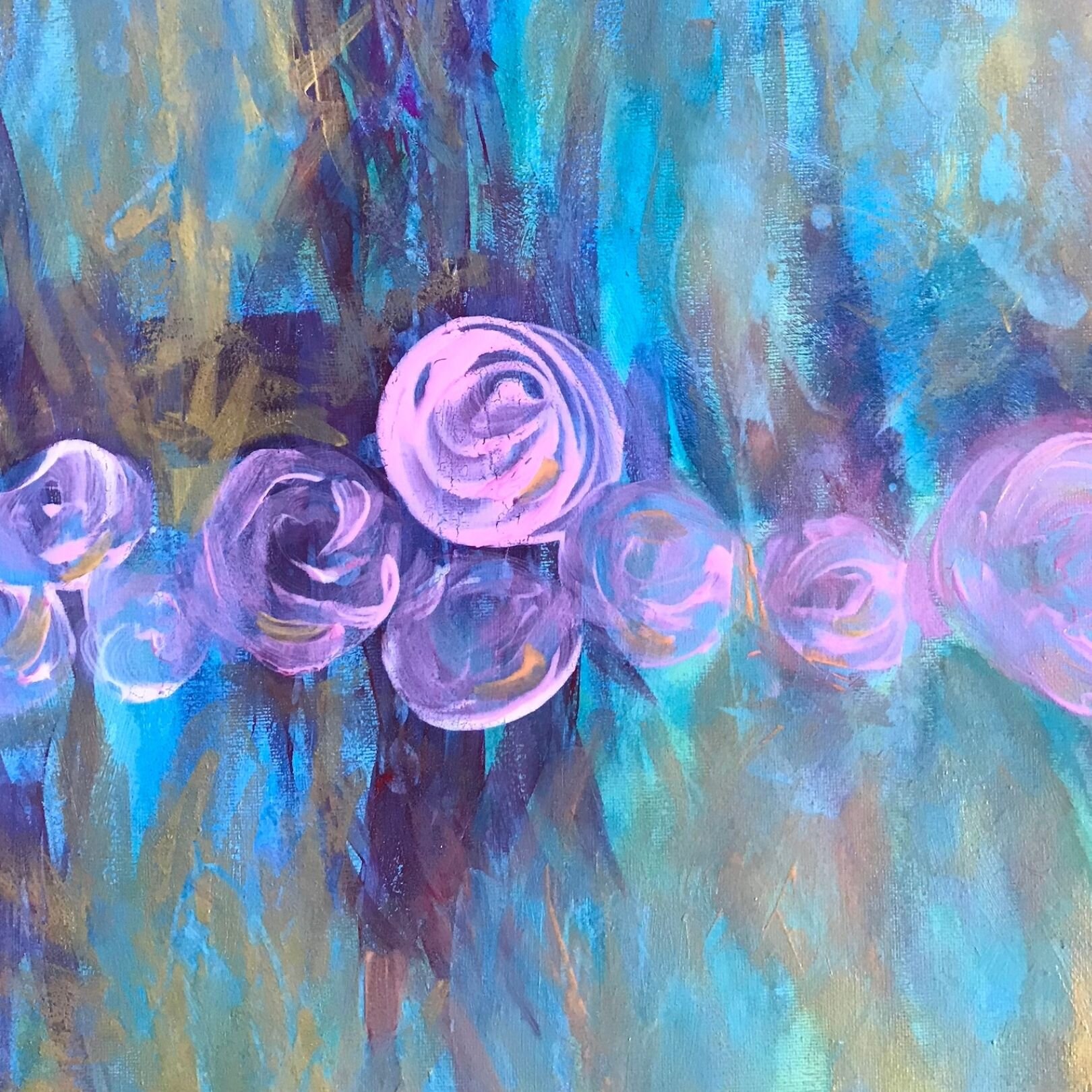 detail of abstract art canvas in reds and greens with a hint of gold and a row of pink roses across the middle