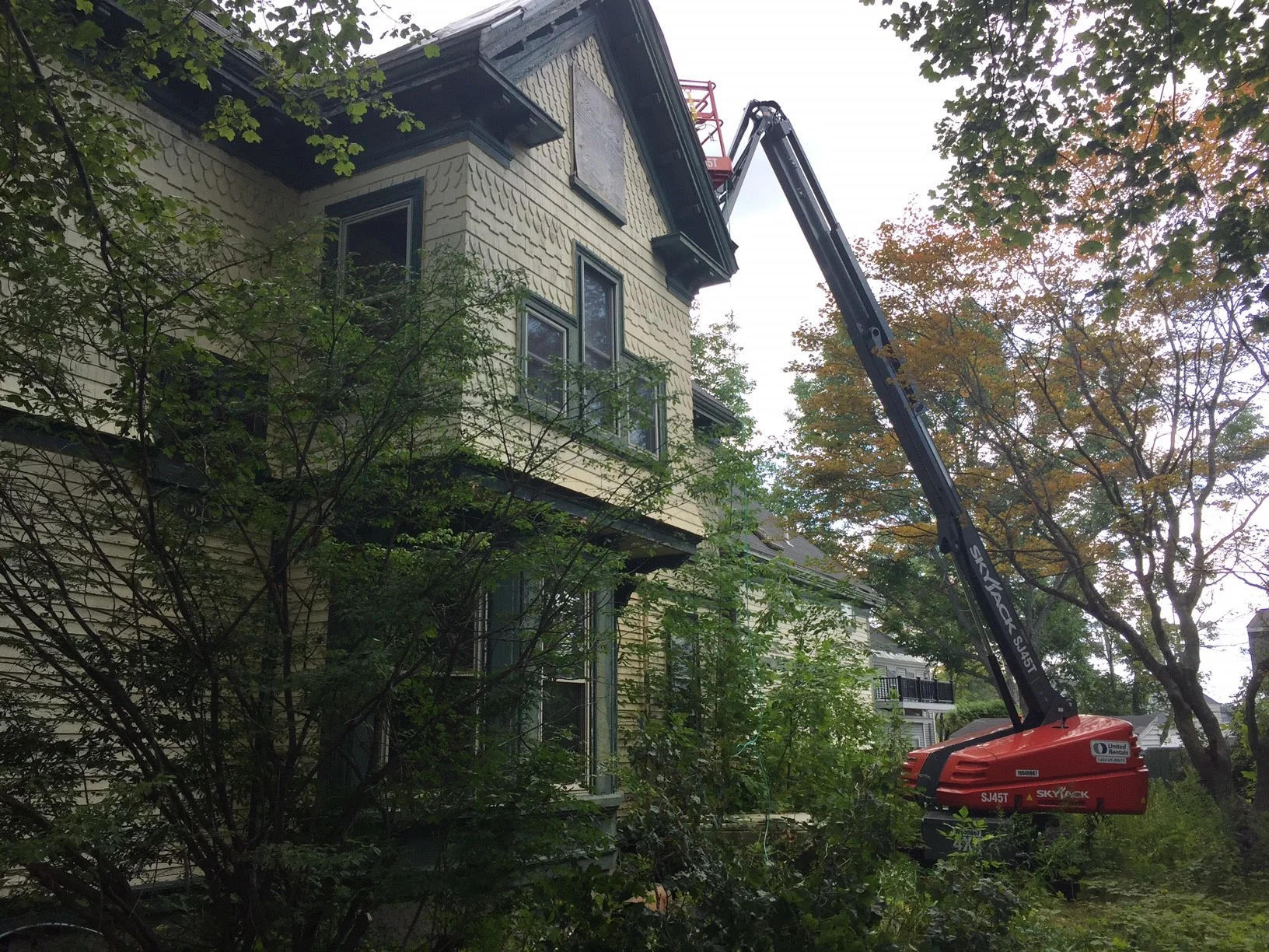 Tarping the roof 2.jpg