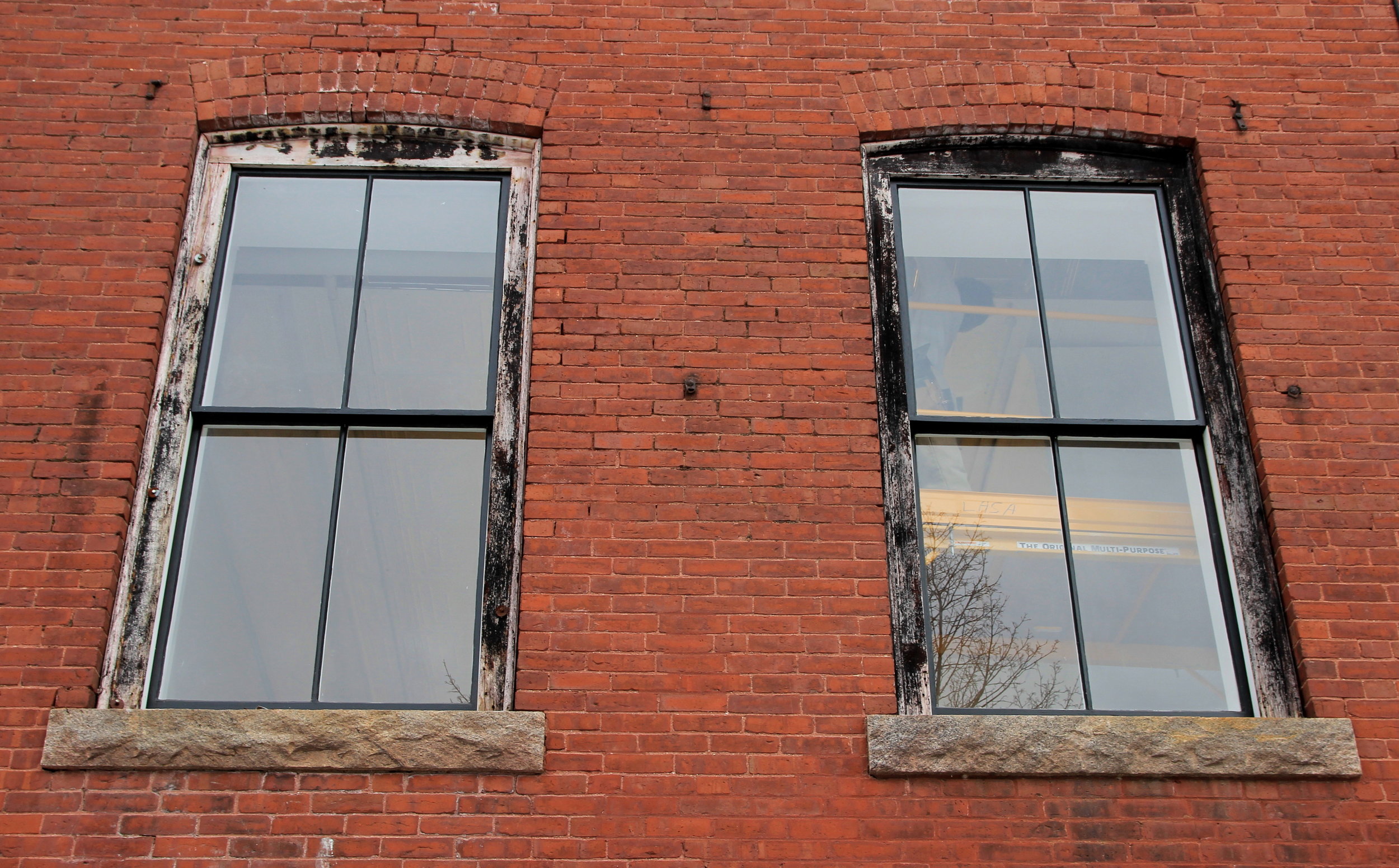 Jan 24 new 1st floor windows, trim will be painted in the Spring.jpg