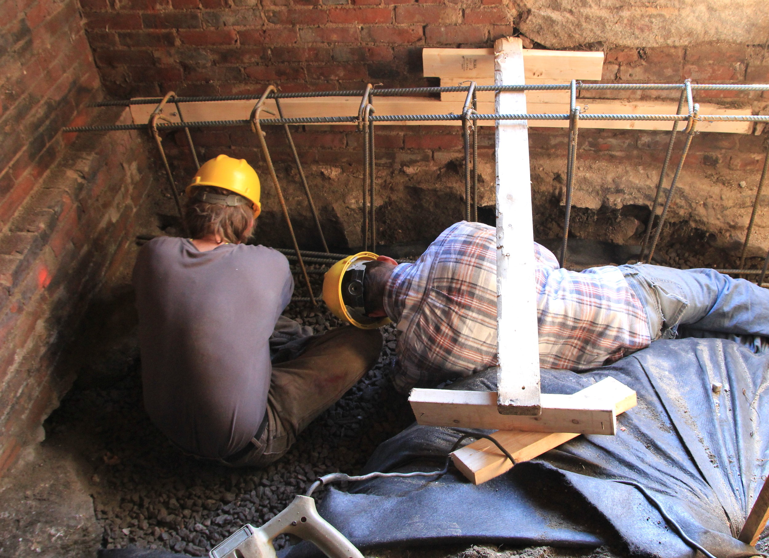 Nov 21 Prepping drainage before the concrete is poured.jpg