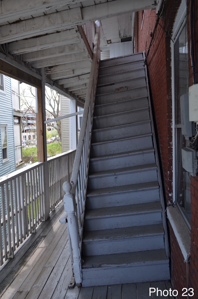 5 Sloping back staircase on porch.png