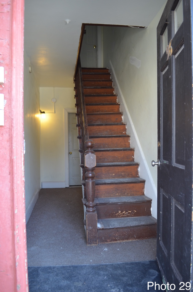 6 Front entry and central staircase.png