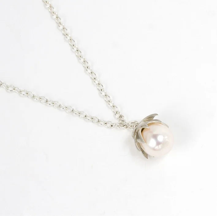 Silver lotus pendant.jpg