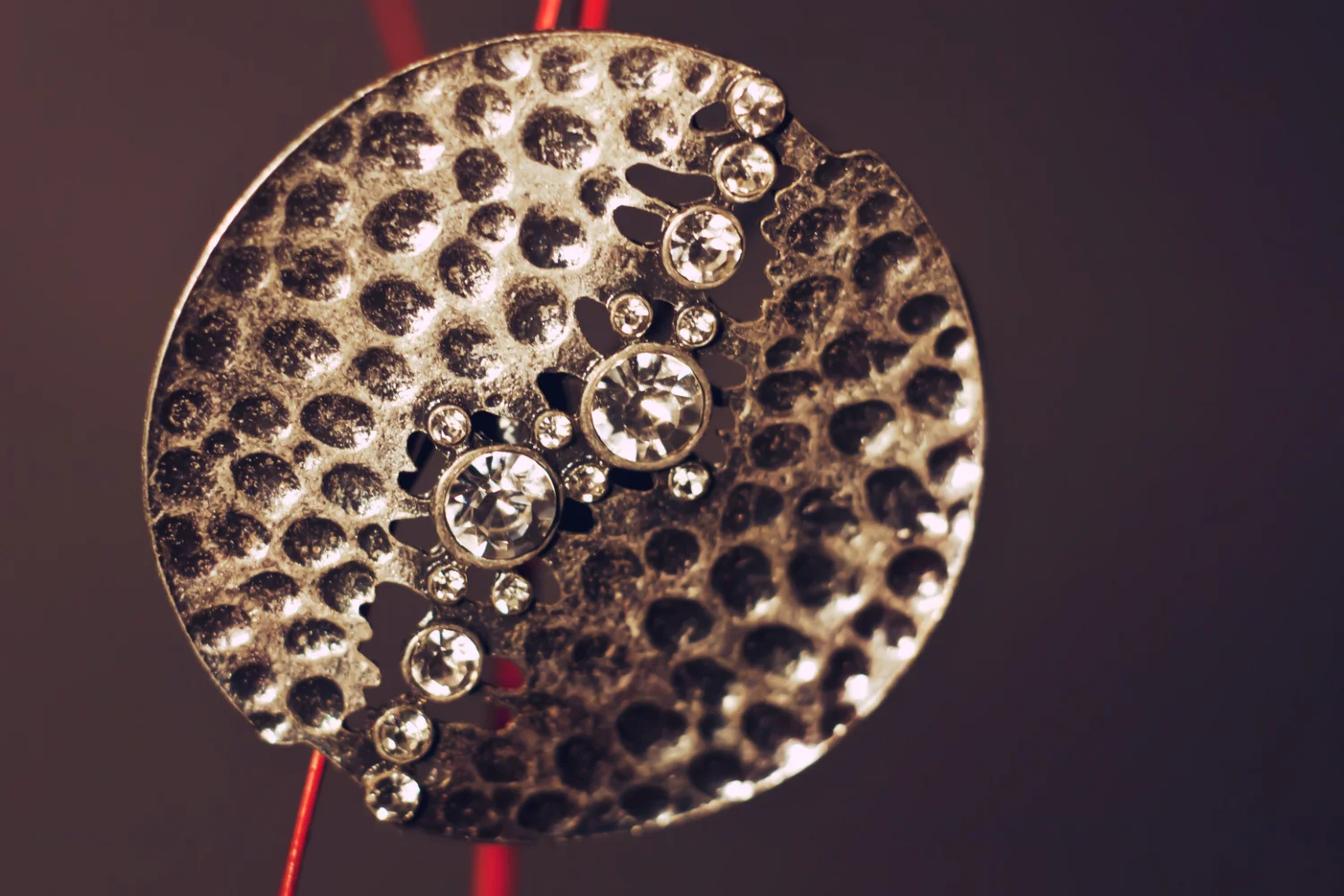 An example of contemporary jewellery utilising the "antiqued" effect. 