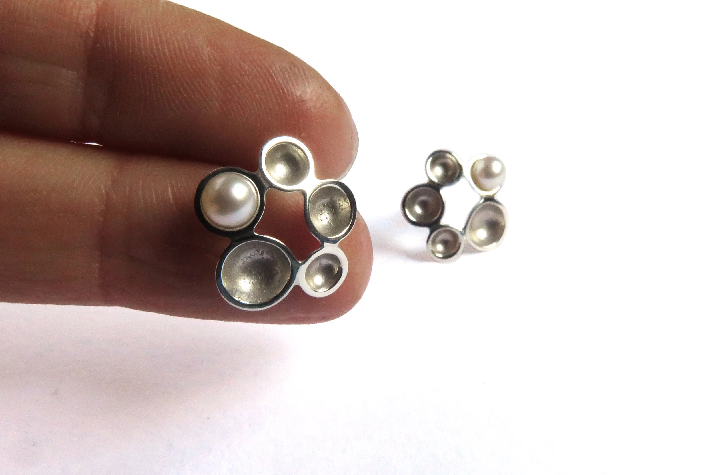 Flower bubble studs w pearl andhand.jpg