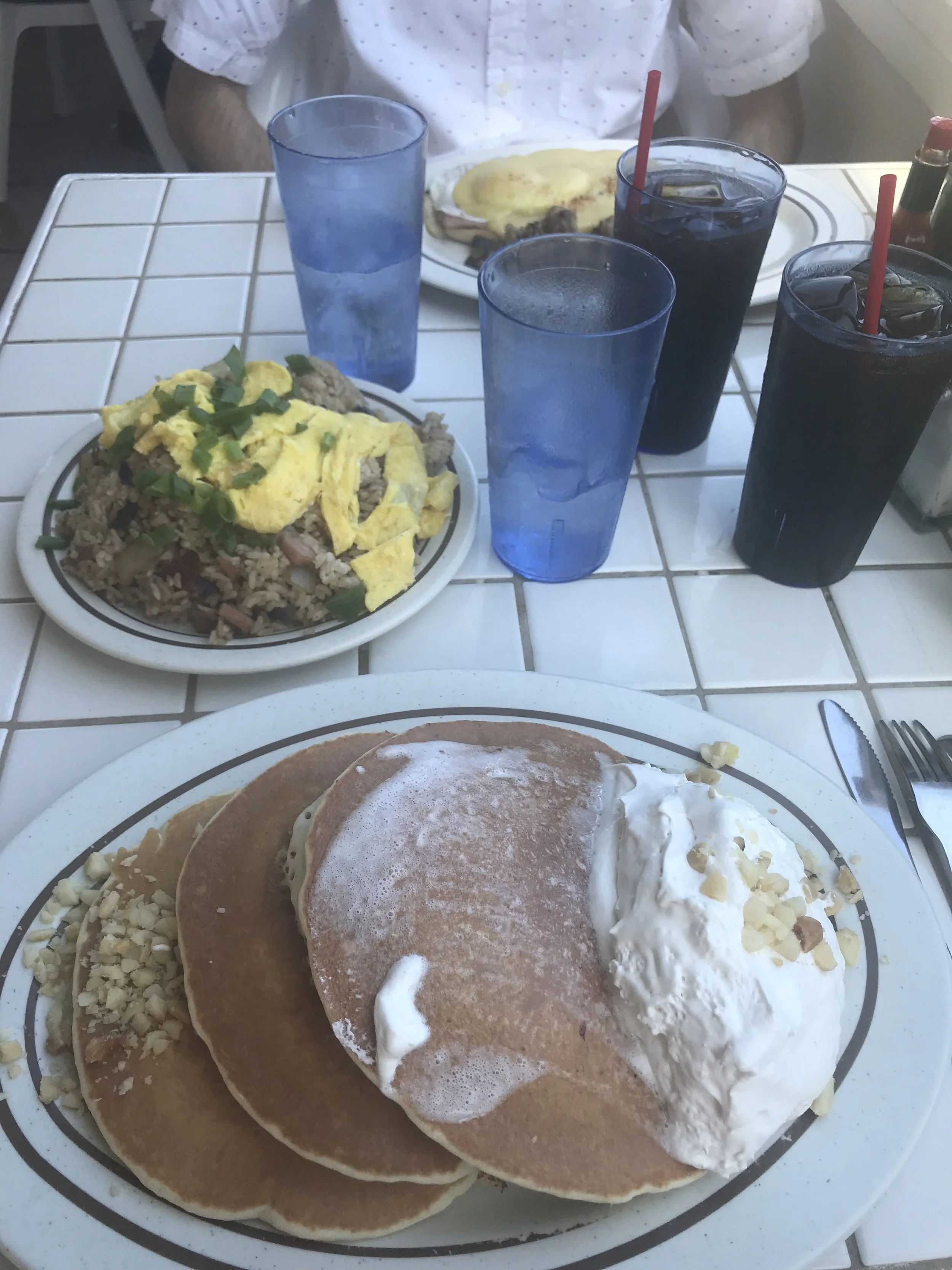 Breakfast fried rice, macadamia nut pancakes, and iced coffee at the Gazebo Restaurant. We lucked out and got a table next to the ocean!