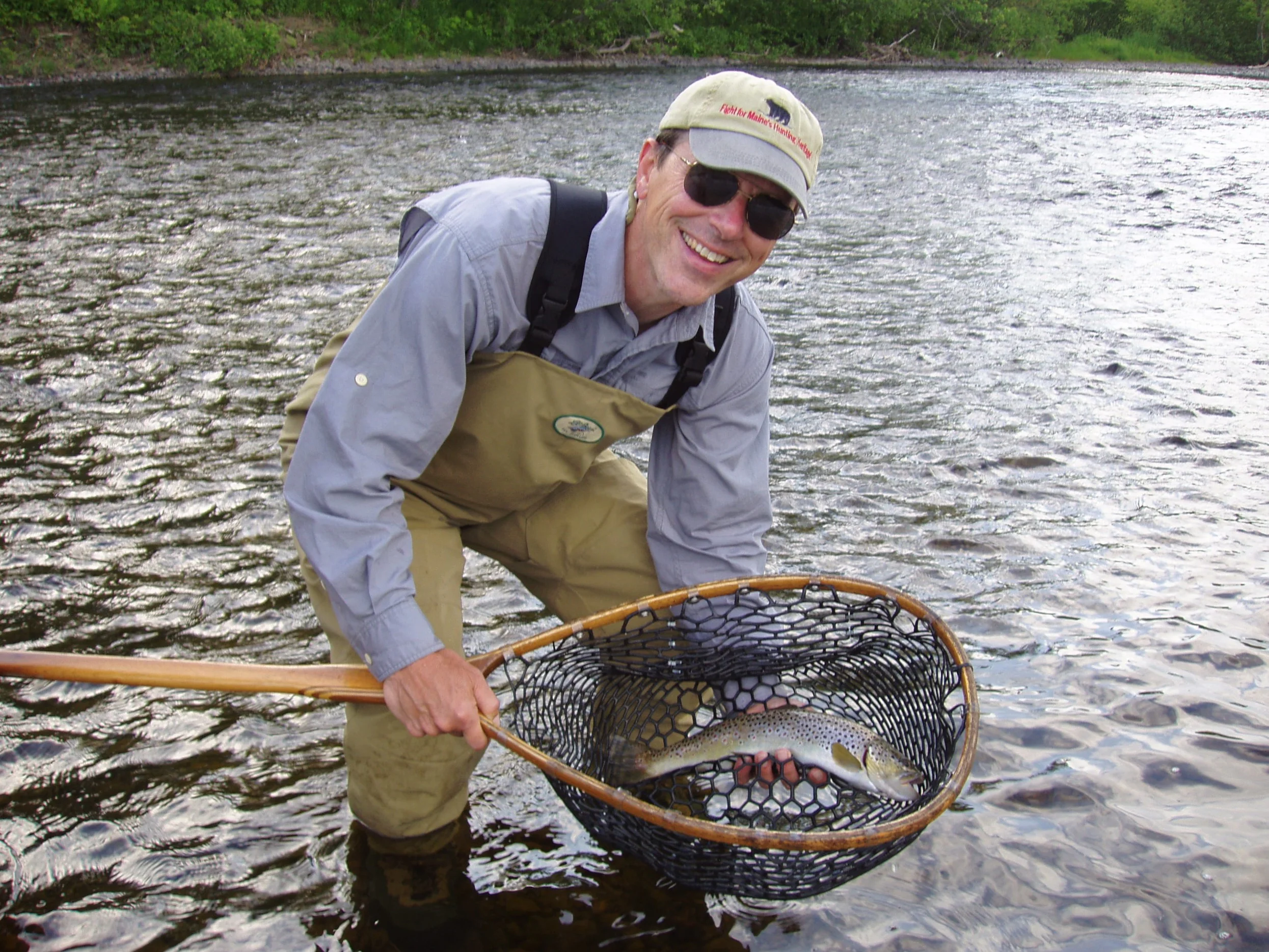 Georhe Smith fishing the Kennebec RIver in Maine with NFC National Vice Chair Bob Mallard.