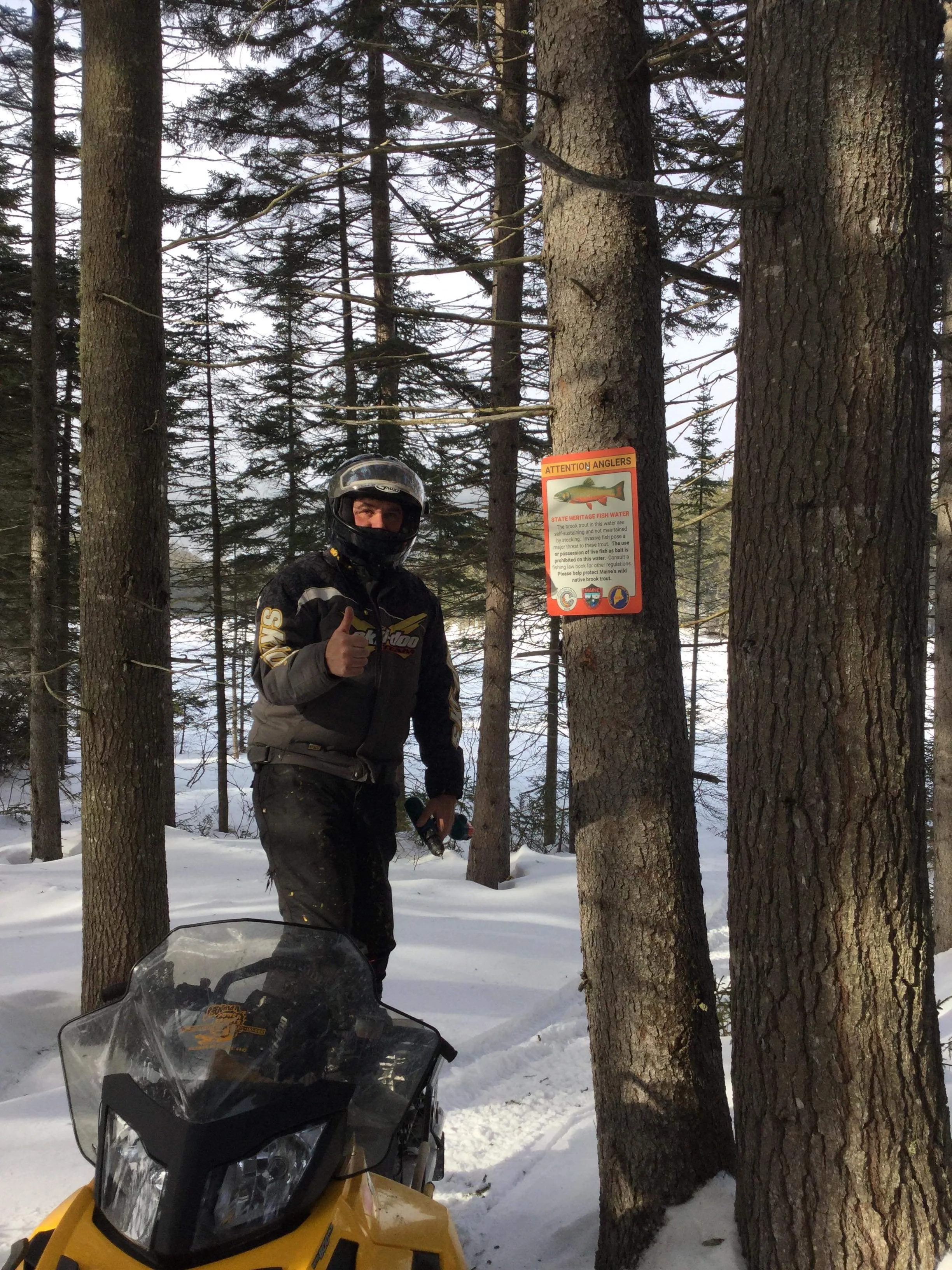 Dedication: Posting Maine State Heritage Fish Informational Signs By Snowmobile
