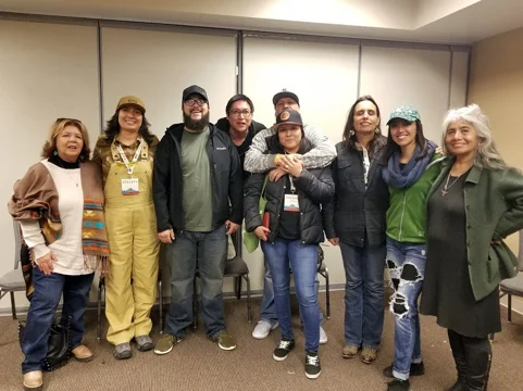 April 7, 2018—Winona LaDuke (third from the left) and Muriel YoungBear (center) gather with other indigenous hemp leaders for a picture at the NoCo Hemp Expo in Loveland, Colo. (Image: Sarah LittleRedfeather)