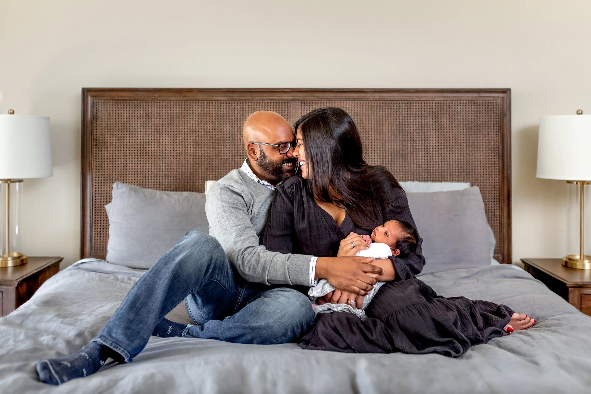 In home Houston Newborn Session with modern touches, boho accents, and vibrant colors.