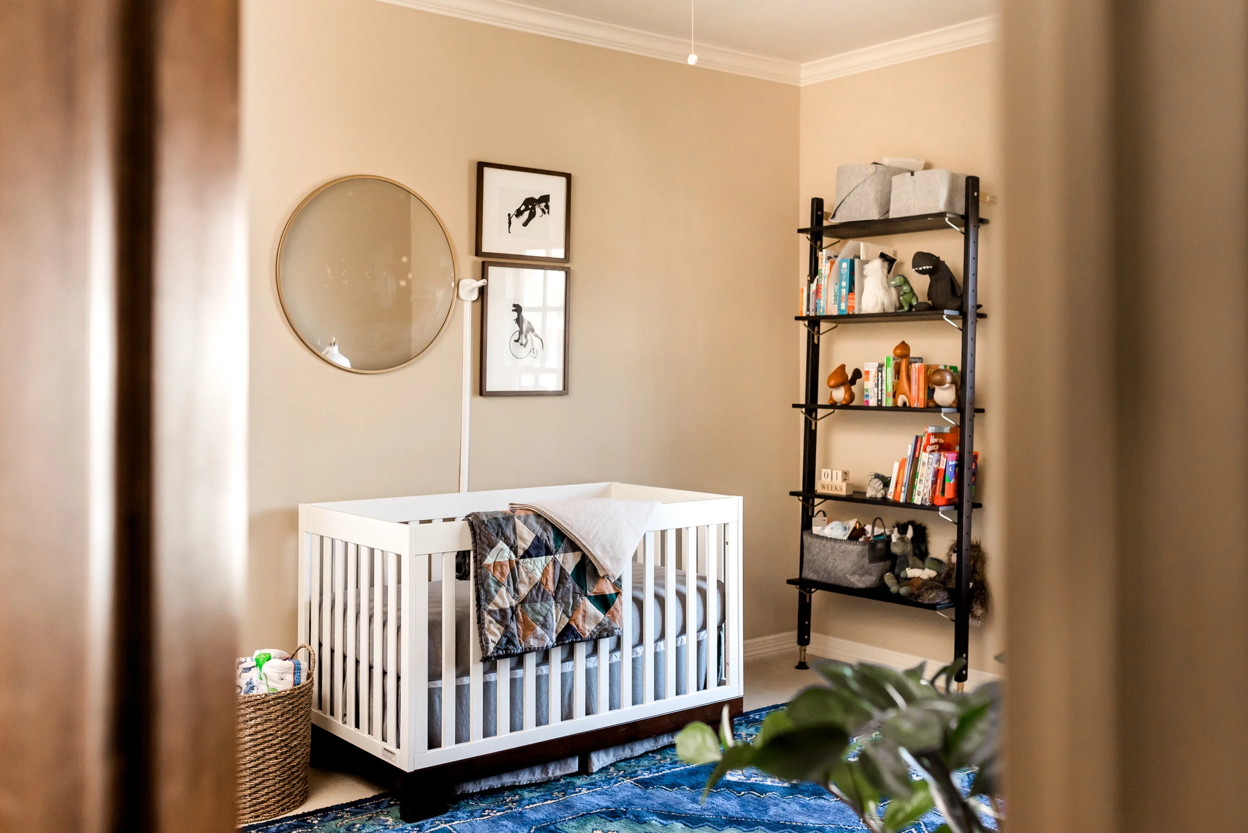 In home Houston Newborn Session with modern touches, boho accents, and vibrant colors.