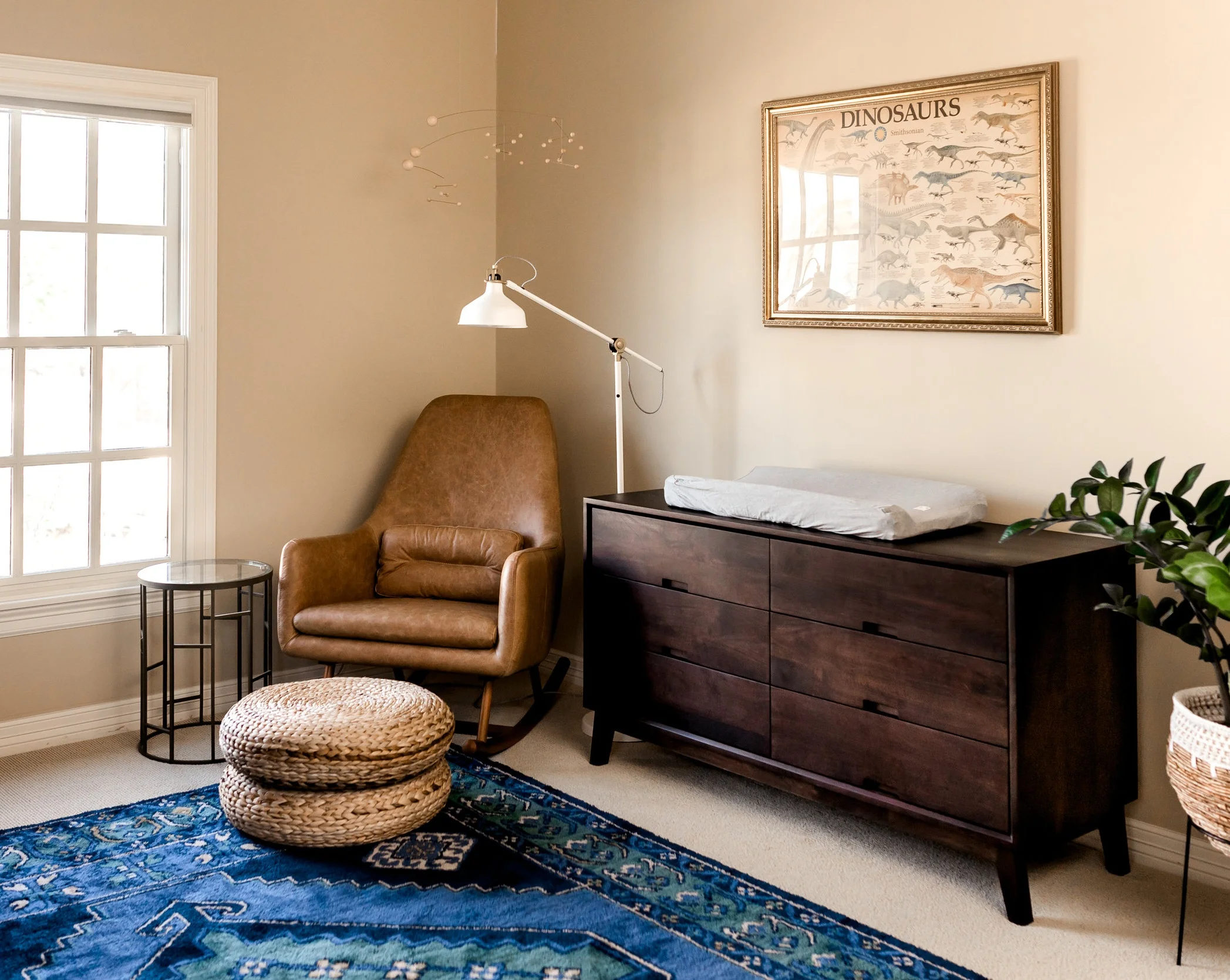 In home Houston Newborn Session with modern touches, boho accents, and vibrant colors.