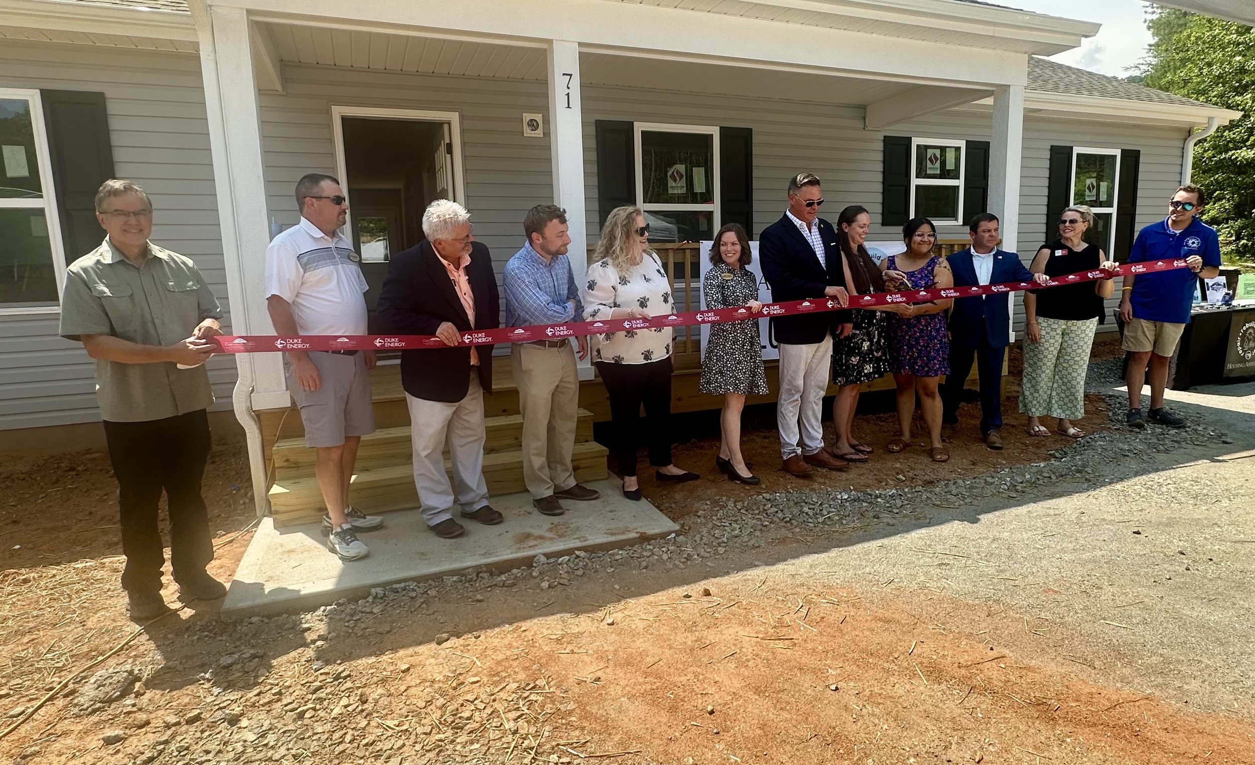 Ribbon Cutting Full line.jpeg