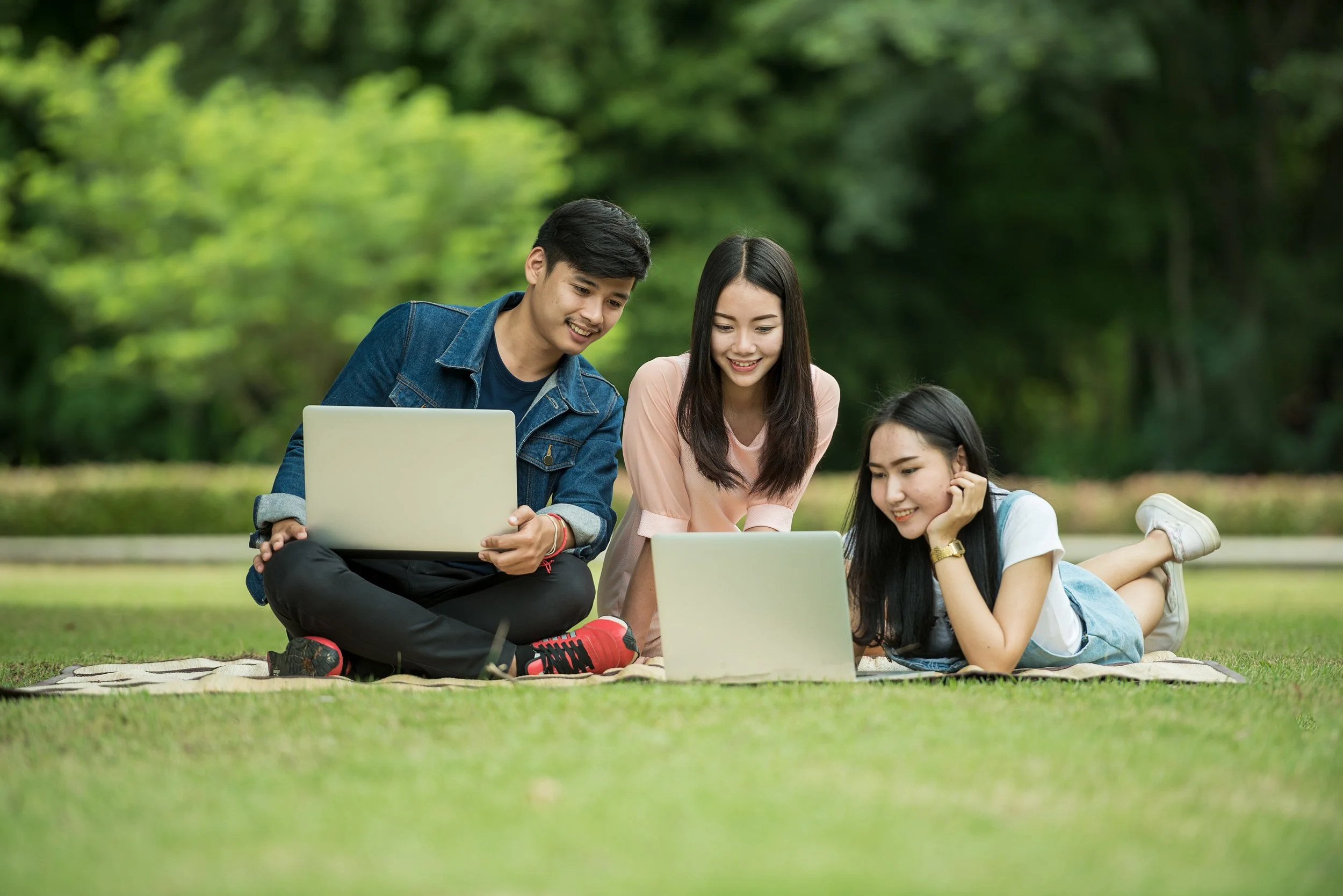 Students looking at laptops.