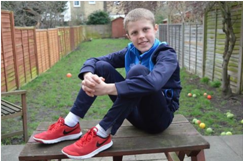 Jane William's son, Morgan in his red sneakers