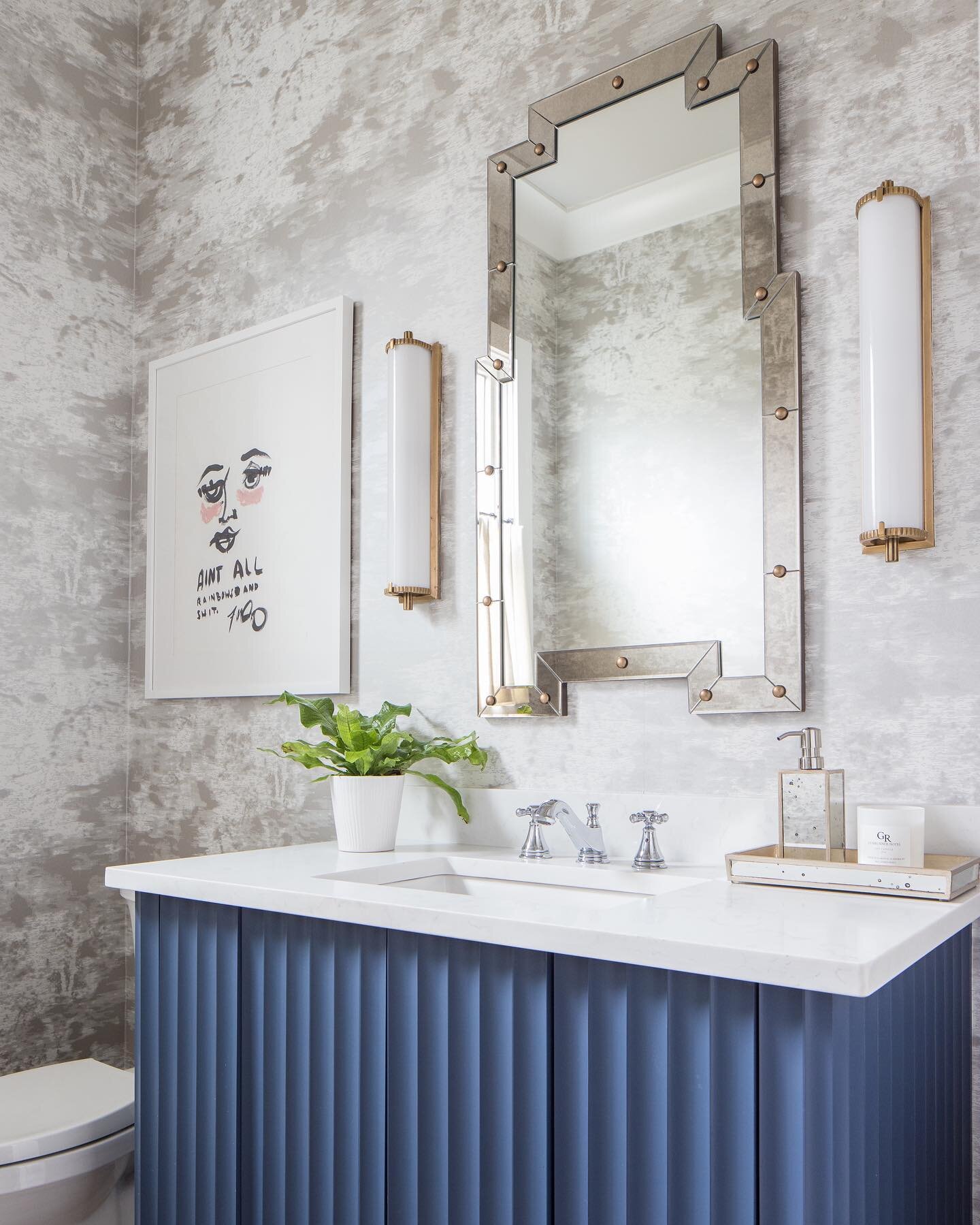 A beautifully bold powder bath to remember! Powder baths are a great space to experiment with fun patterns and colors! I love the drama of this vanity mirror and how well it pairs with this soft and dreamy wallpaper. 
&bull;
&bull;
&bull;
&bull;
&bul