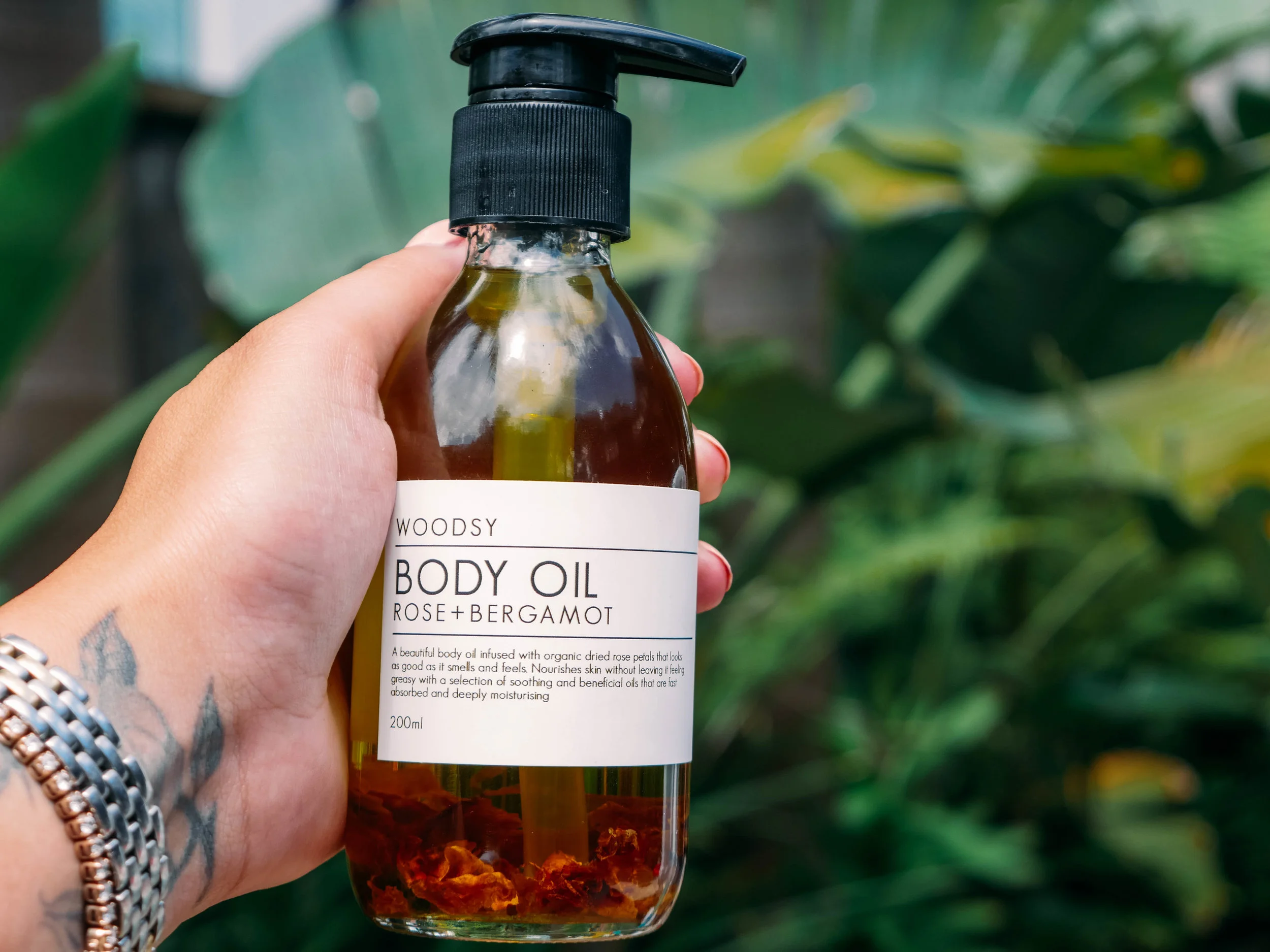 Look at those beautiful roses hanging out in there, a touch that makes this body oil feel very lux. 