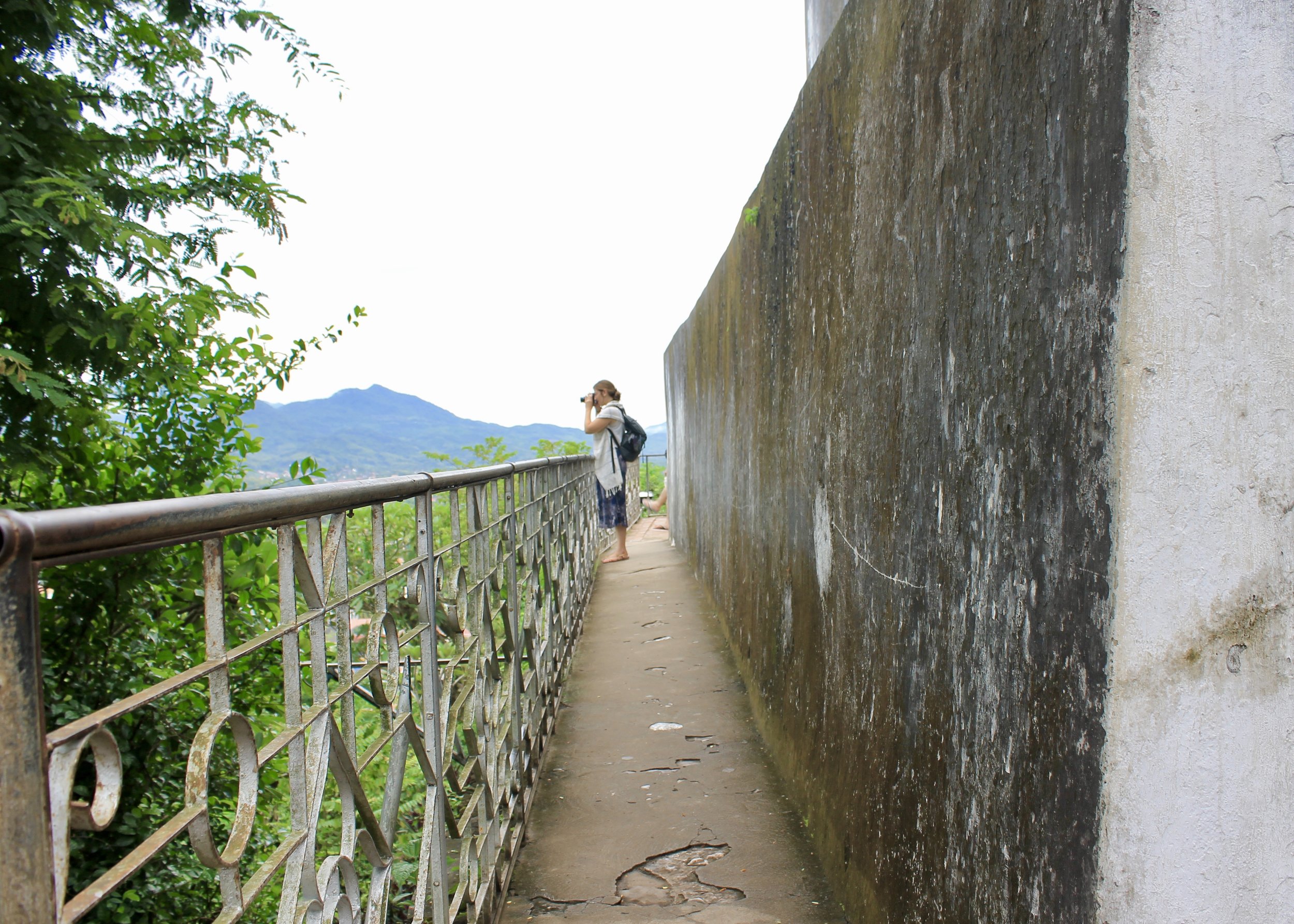   Louise will soon become the sole Laos photographer for our trip. Good thing she practices with the eye of a tiger.     