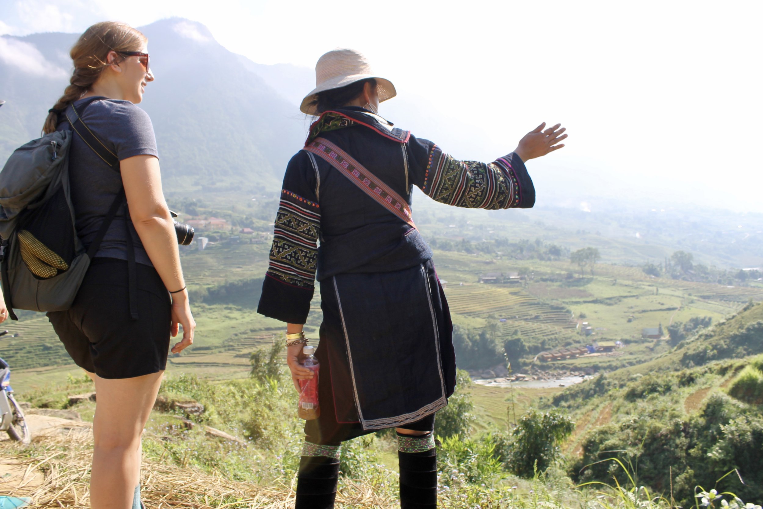  Zho points out our first destination, a bamboo forest leading to a waterfall.&nbsp;       