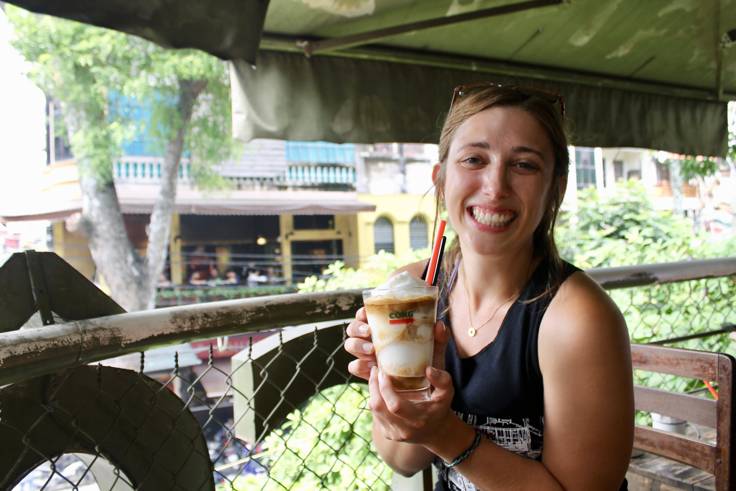  Louise is pumped to try her first coconut coffee at Cong Cafe.    