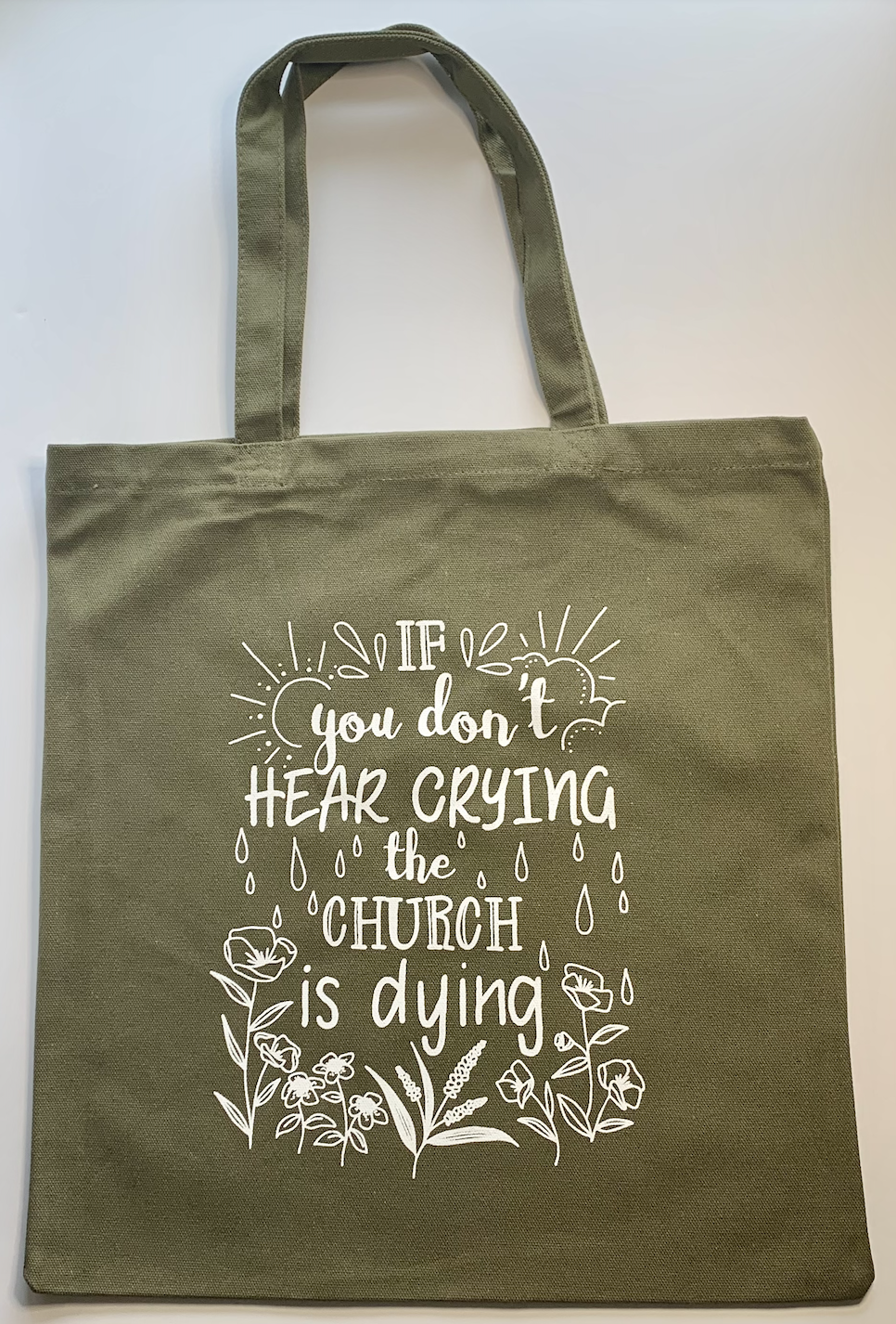 If you don't hear crying Tote Bag by The Green Paintbrush