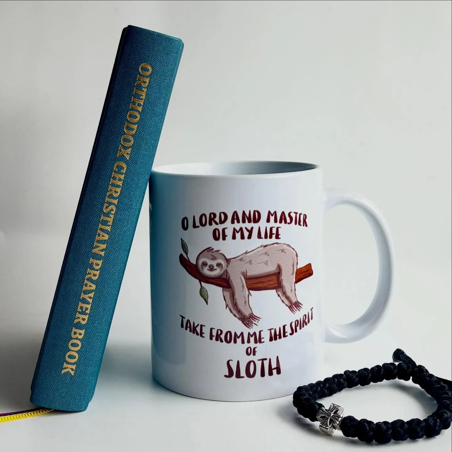 🤭🦥🙏🏽 We couldn&rsquo;t resist adding this mug to the Lent + Pascha Shop this year. The design (by @ikonographics) is also available as a vinyl and a holographic sticker!