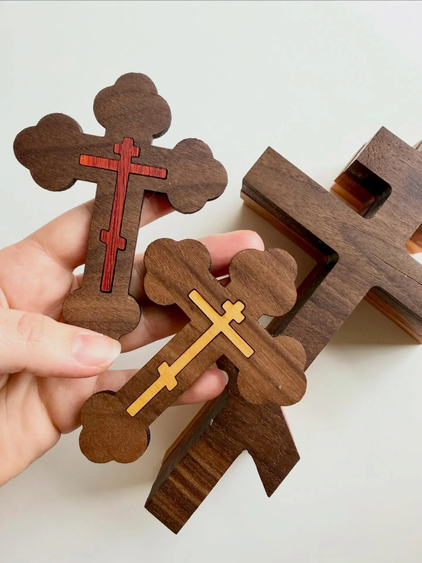 We got the most beautiful restock of wood wall crosses in the mail! These are handmade by an Orthodox woodworker in Colorado. The small size has 2 color options (no stains are used, those are the natural@wood colors!), and they&rsquo;re a great size 