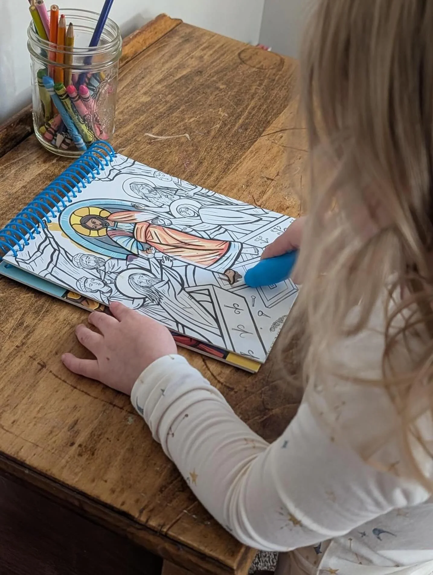 Reusable water art books where the colors in icon illustrations appear when painted with the water pen!