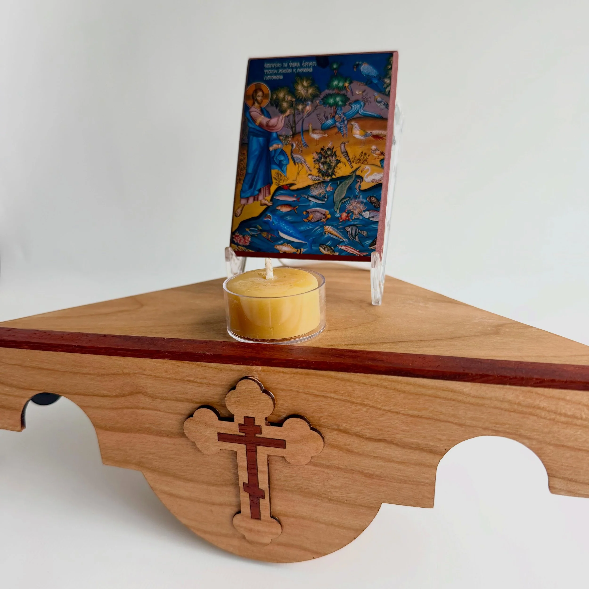 Brand new! Check out the gorgeous new corner shelves we just added to the Home + Prayer section of our website. They&rsquo;re handmade of solid wood by an Orthodox woodworker in CO, and the three bar cross on the front is inlaid within the budded cro
