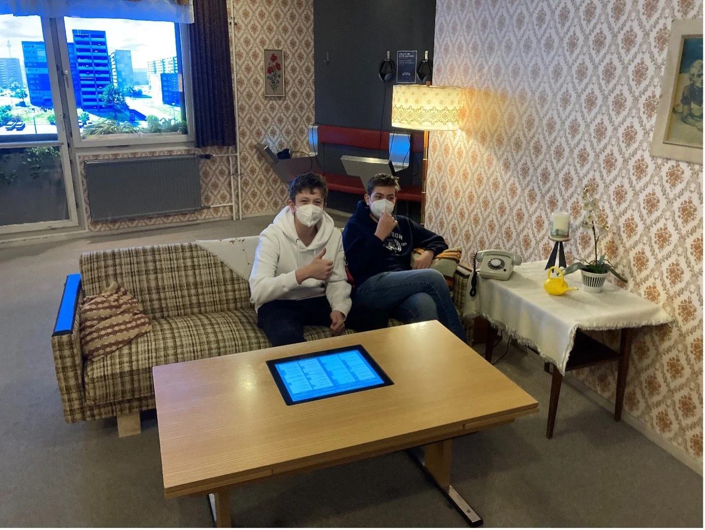 A cosy television evening in a typical GDR-flat with Max and Lukas