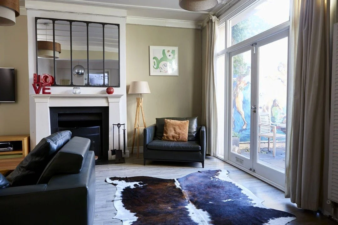 &bull; Kensal Rise &bull; 

This incredible, unique, five bedroom, family home located in Kensal Rise has three rooms available to creatives. This large bedroom has a comfortable double bed, work space area and closet for storing clothes. The Blue ro