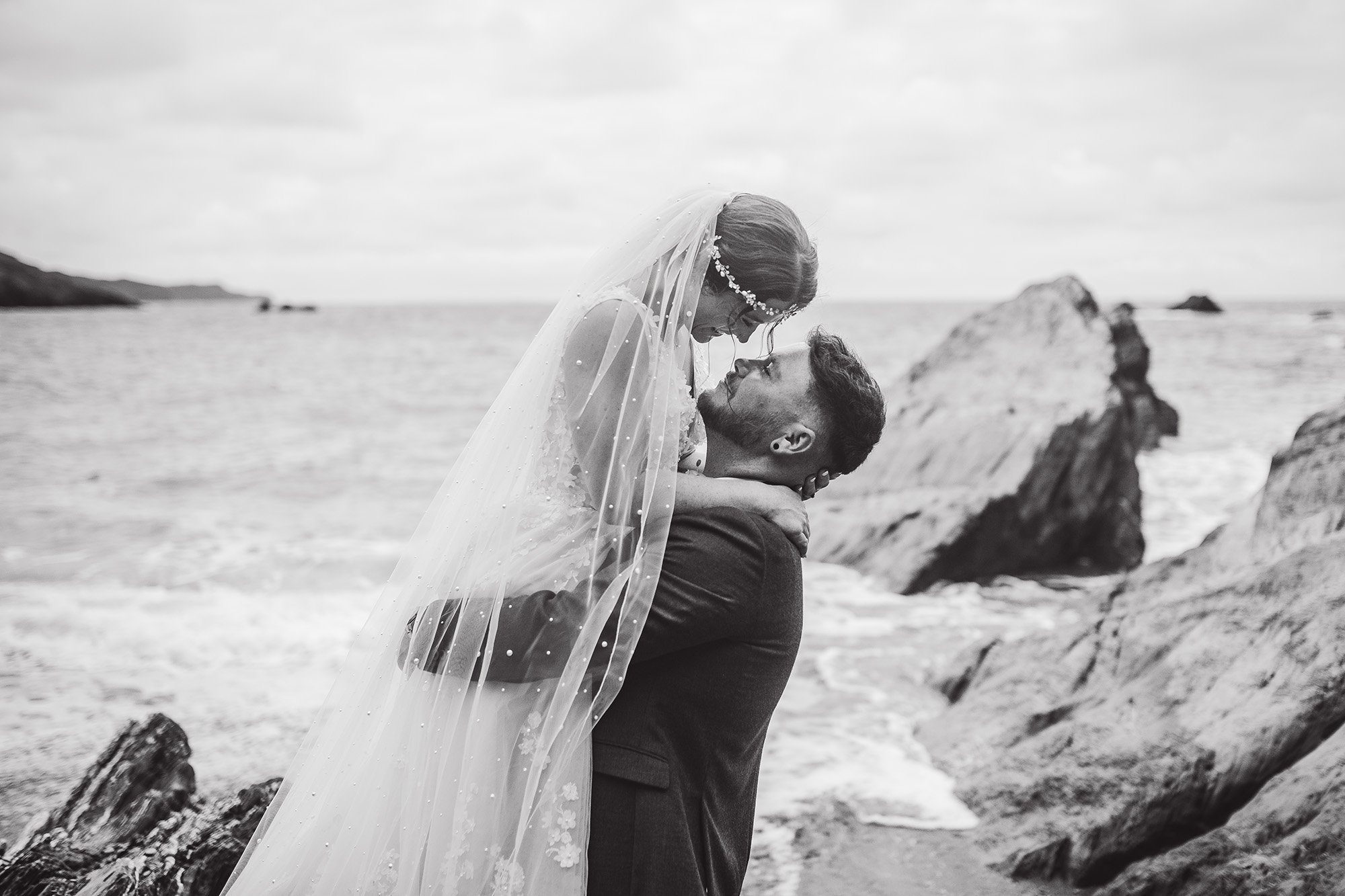 bride-groom-beach-portrait-the-tunnels-ilfracombe-devon.jpg