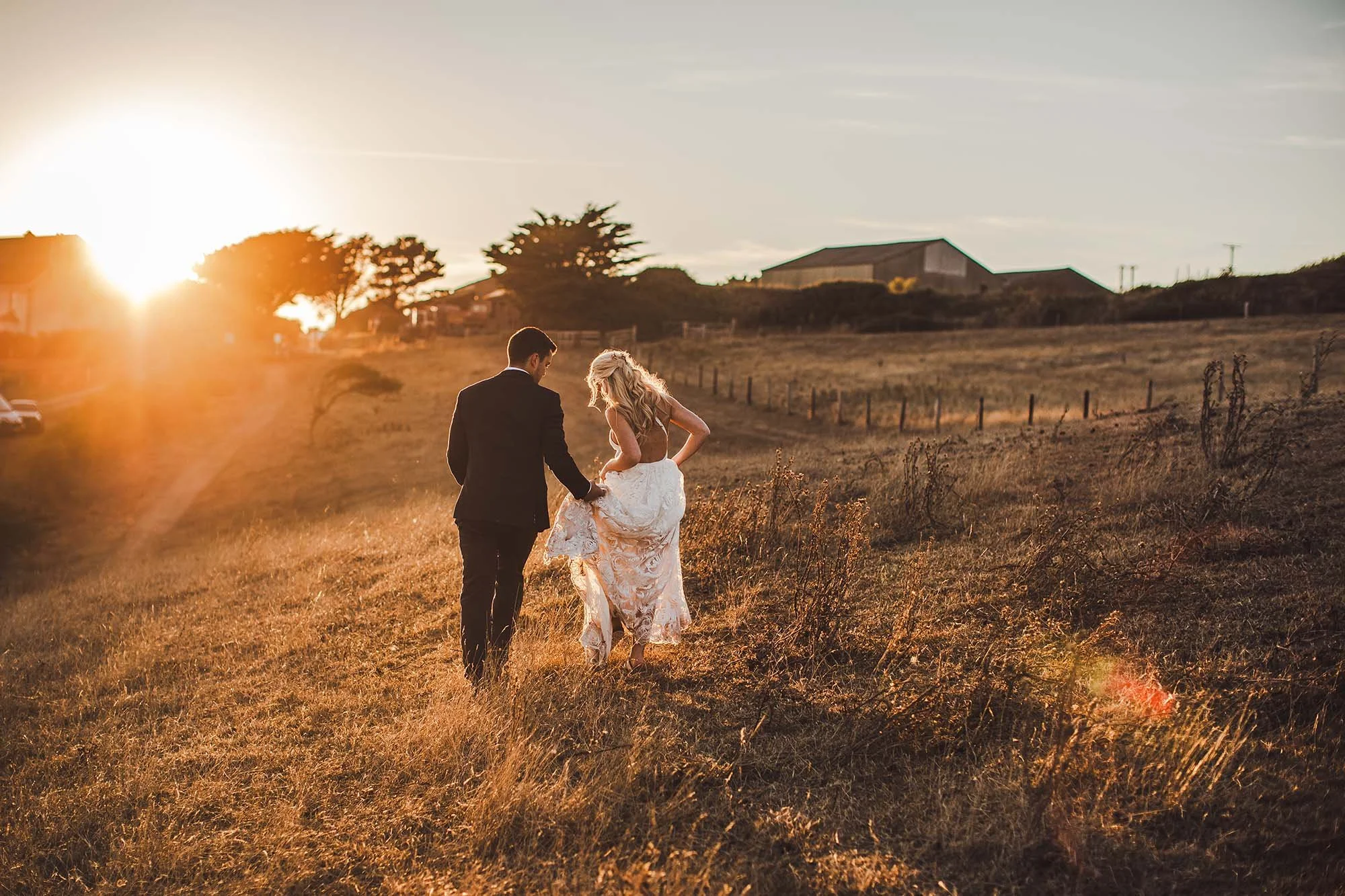 golden-hour-bride-groom-walk-bigbury-bay-wedding.jpg