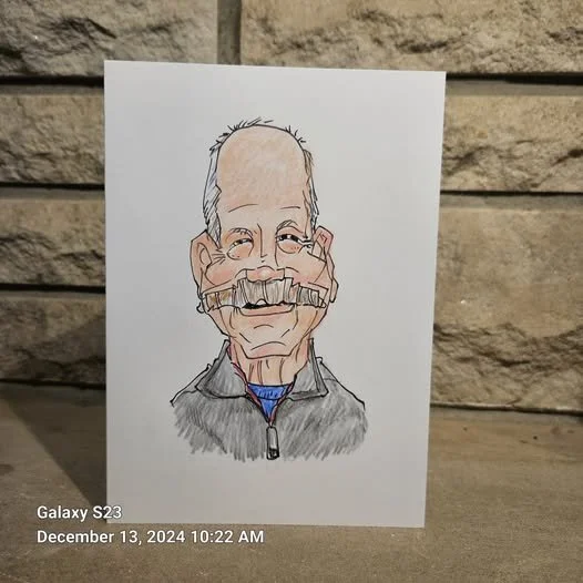 Hand-drawn caricature of an older man with glasses, a mustache, and gray hair, wearing a zip-up jacket, placed against a brick wall.