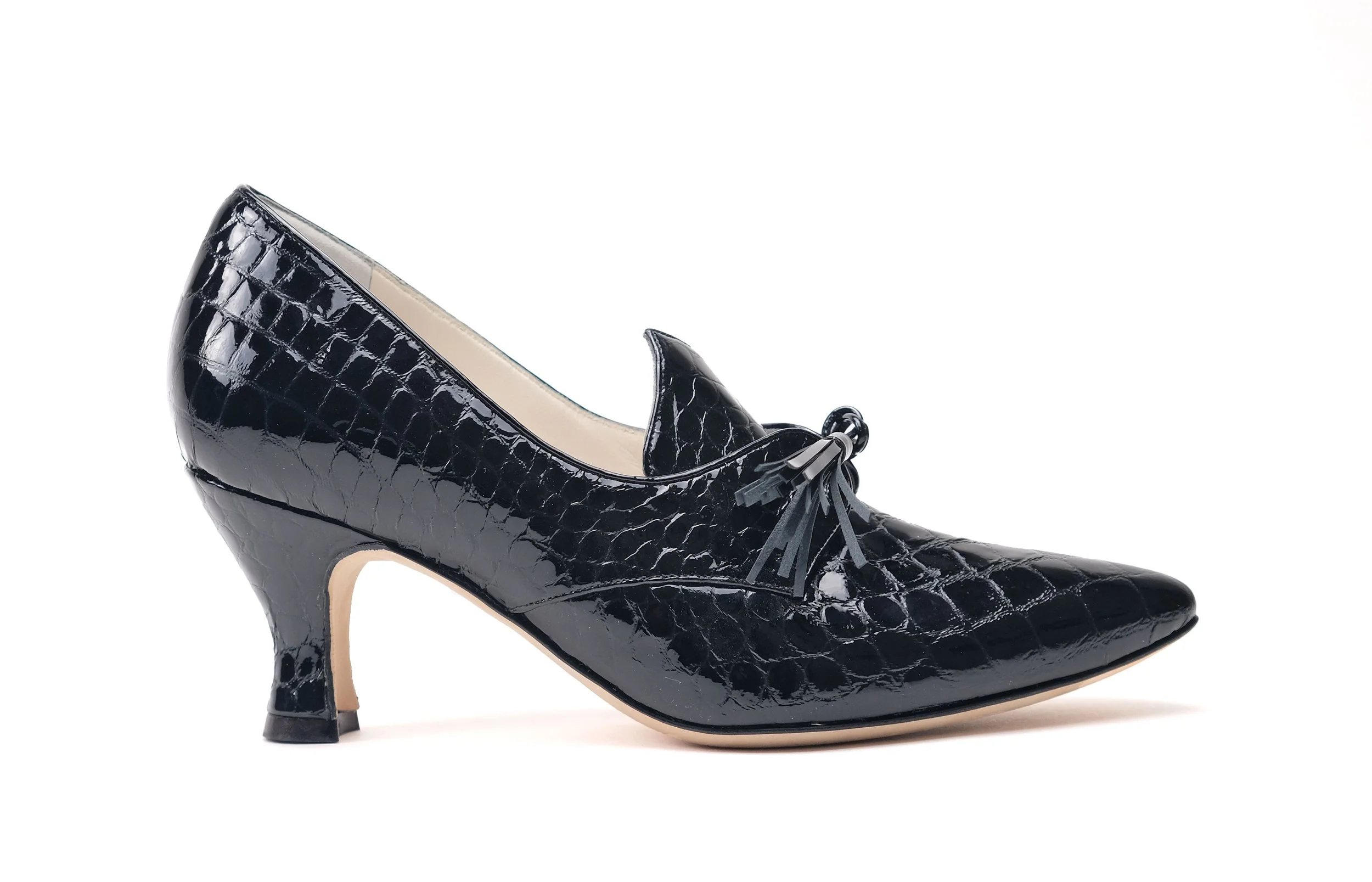 Evelyn Ford Casey black crocodile embossed leather luxury pump side view tassel detail