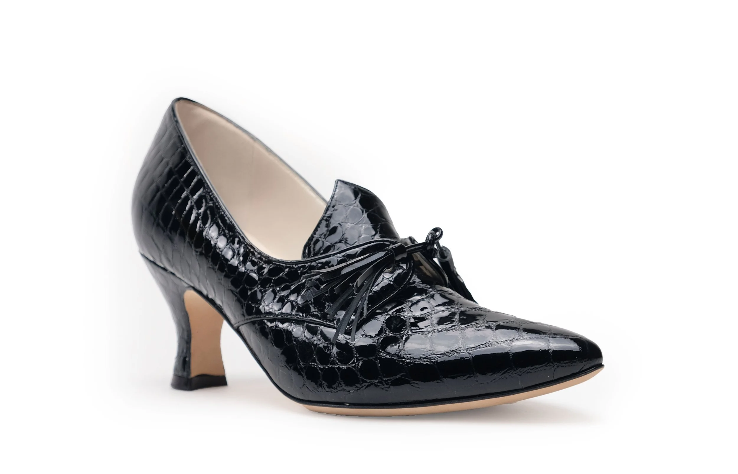 Casey black croc embossed leather pump front angle black tassel sculpted heel