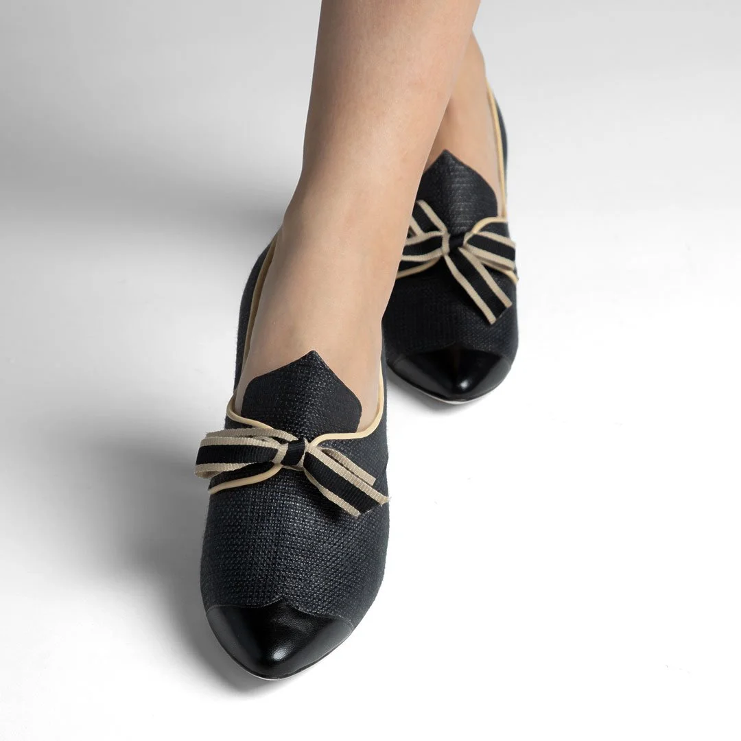 Casey black raffia pump toe close-up taupe bow and cap toe detail