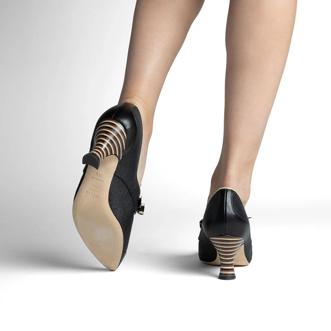 Casey black raffia heel back view sculpted stripe heel luxury pump