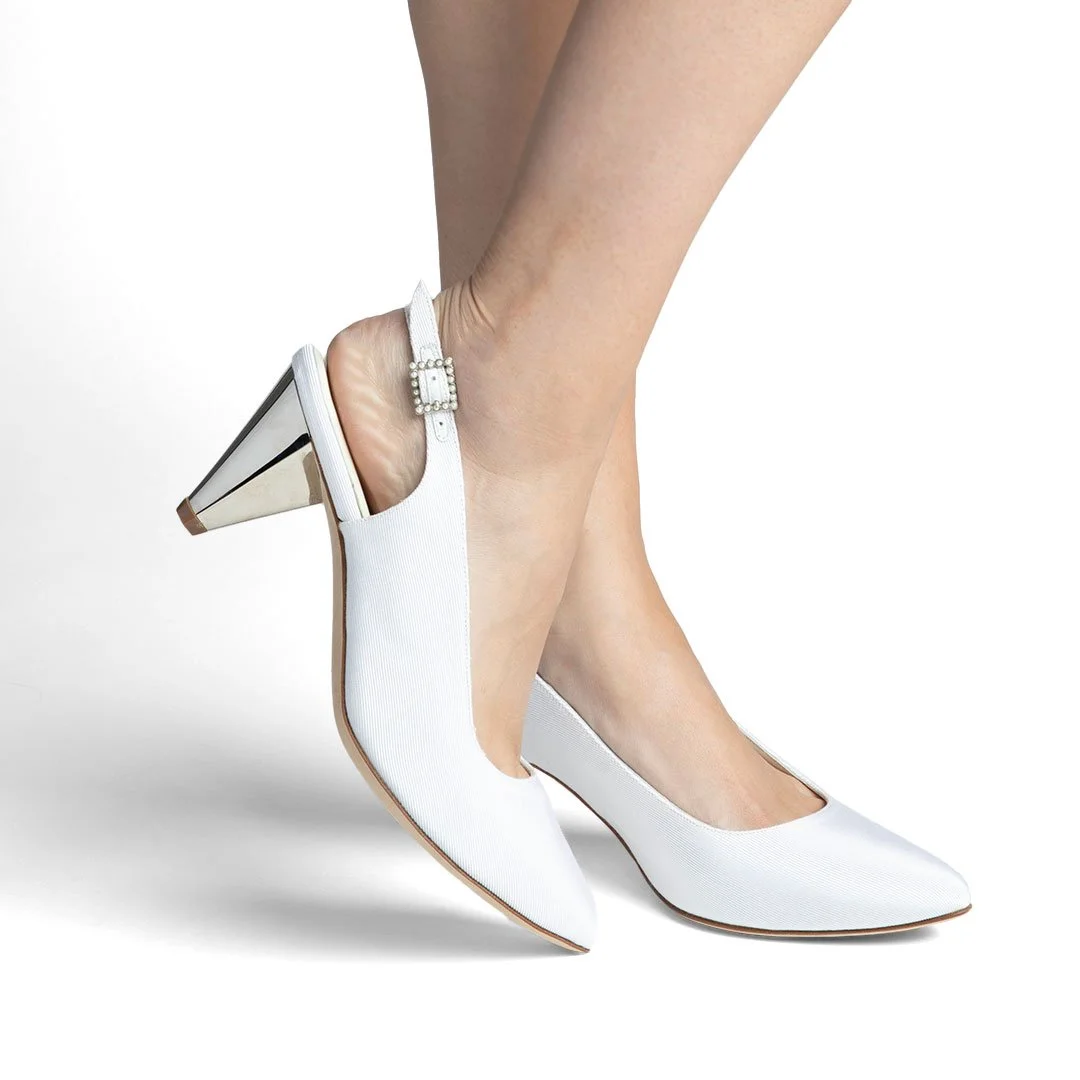 Kalinda white silk grosgrain bridal slingback worn side view chrome heel lifestyle wedding shoe