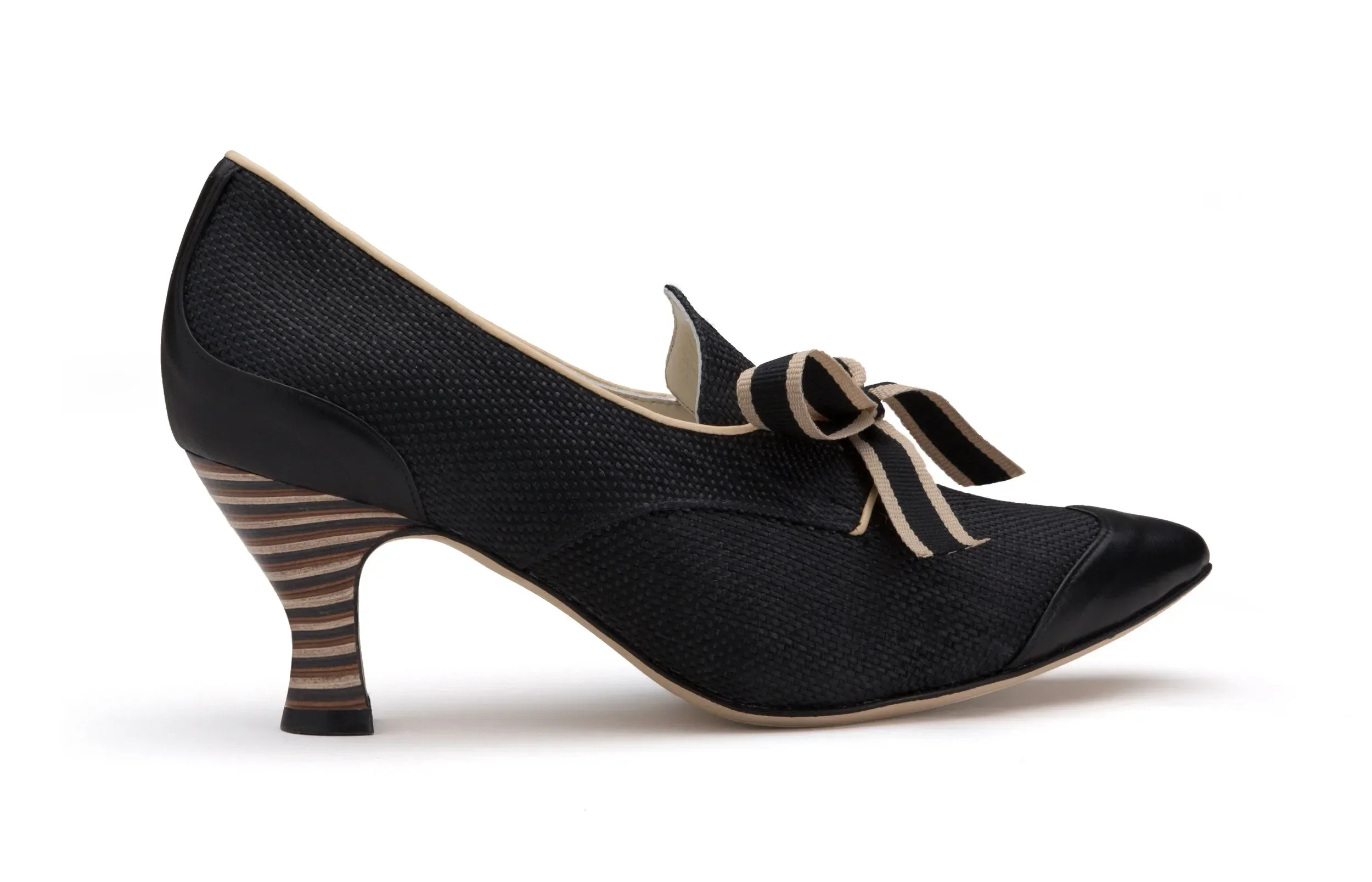 Evelyn Ford Casey black raffia luxury pump side view sculpted stripe heel