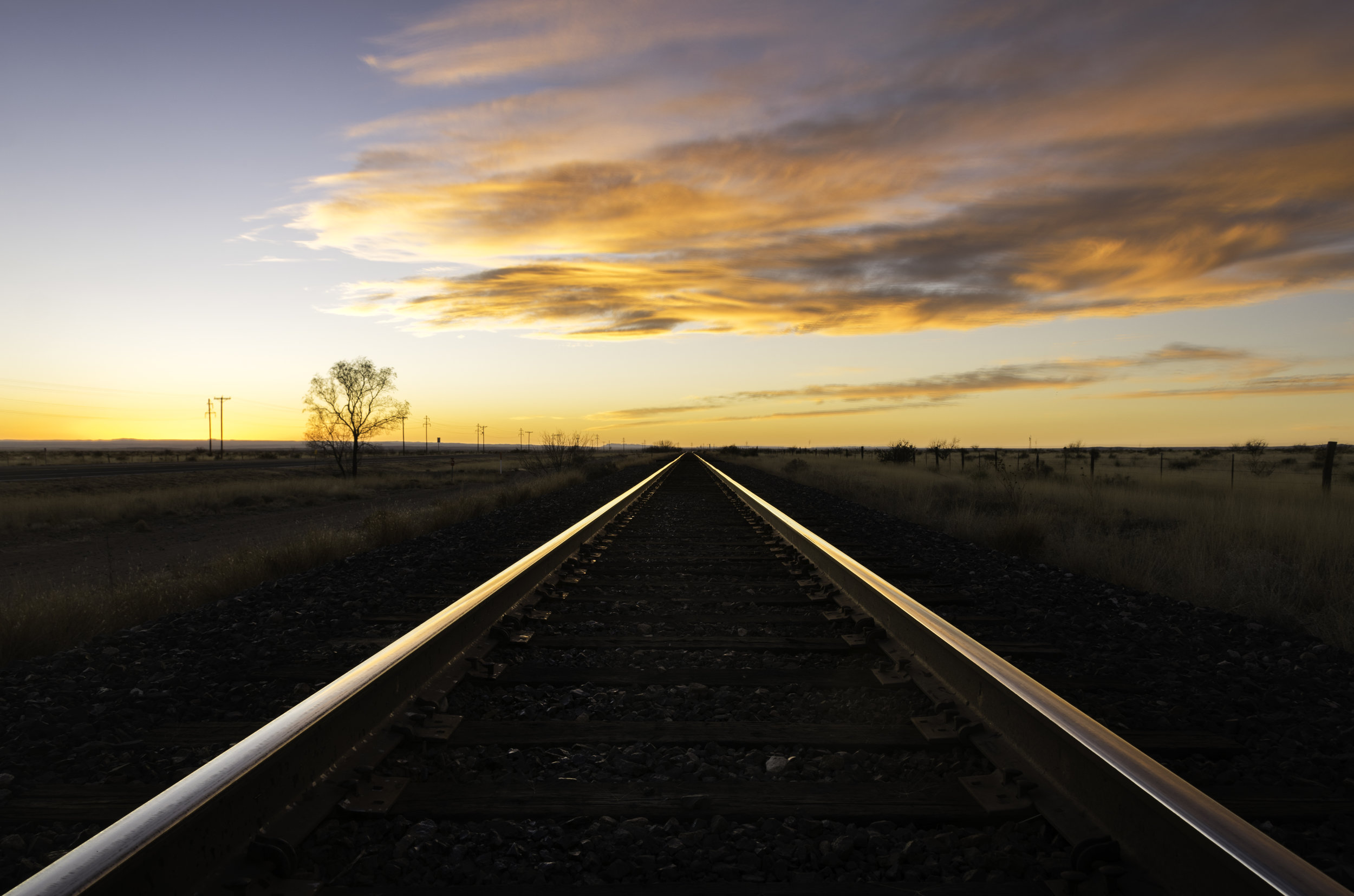 Railroad Tracks Sunset.jpg