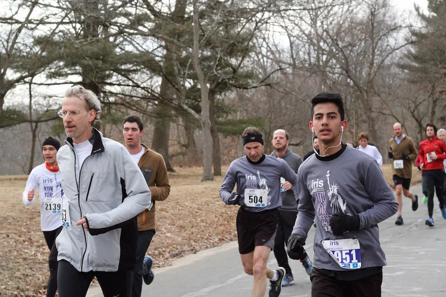 Mohanad Mahmood (right) heads into the final stretch. To his left is Hamdenite David Rabinowitz 